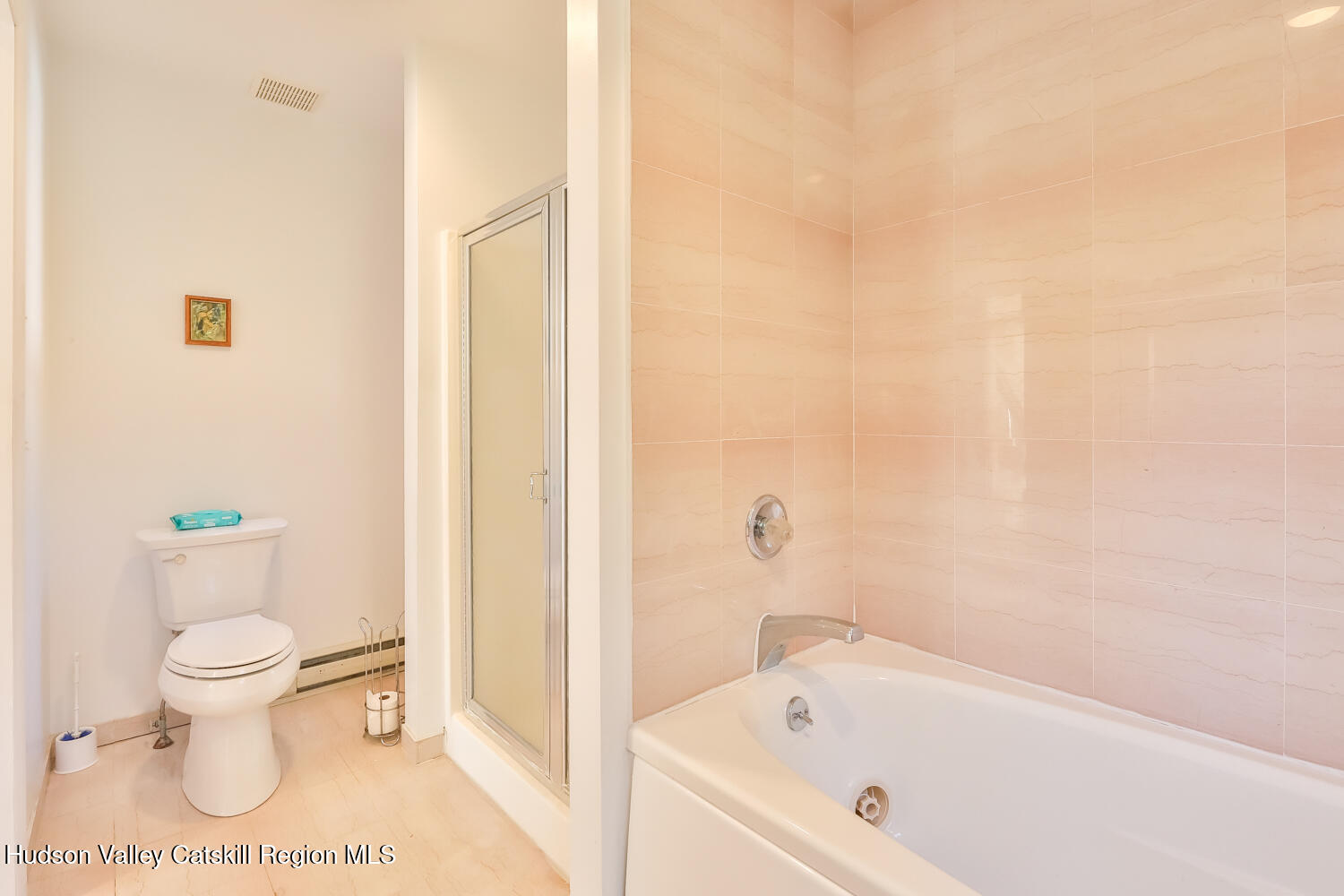 91 Beaver Hill Road Windham, NY 12496 - Photo 25 of 35 a bathroom with a toilet and a bathtub