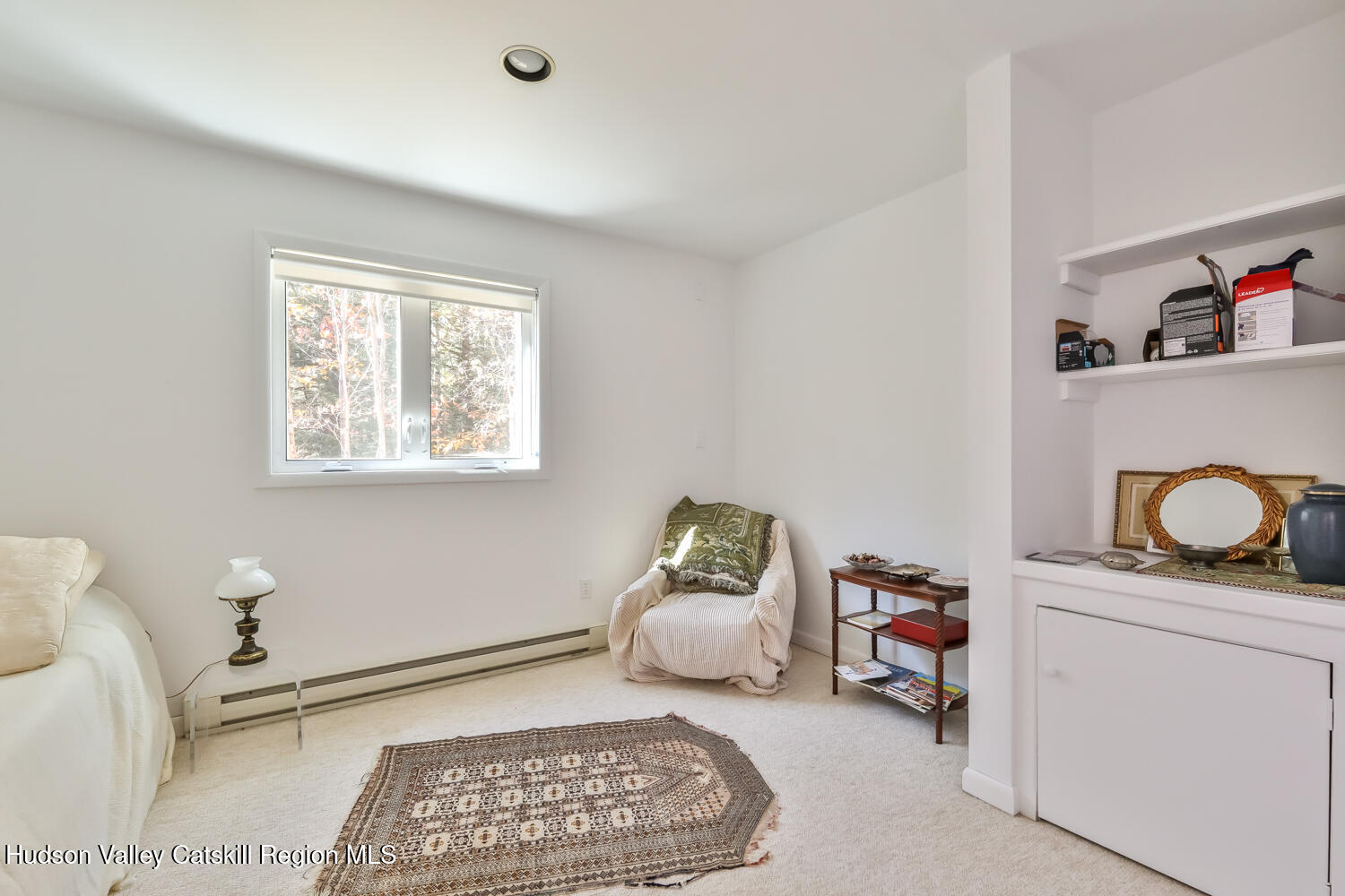 91 Beaver Hill Road Windham, NY 12496 - Photo 26 of 35 a bedroom with furniture and a window