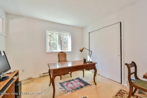 a workspace with a table and a couch