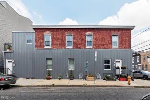 a cars parked in front of a building