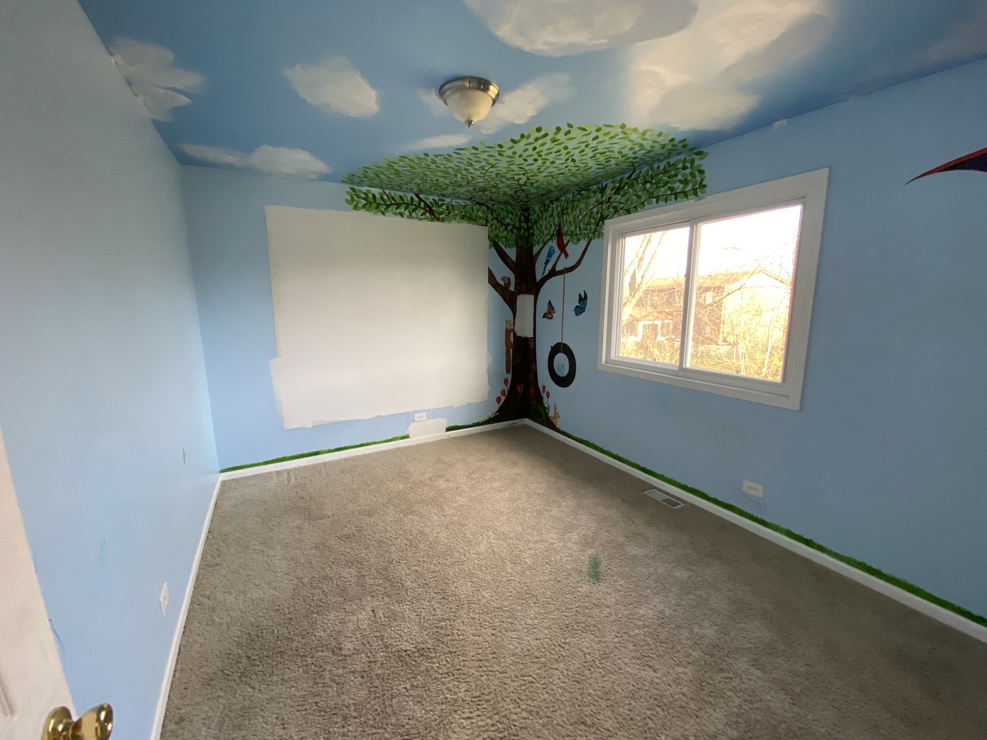 43 Pheasant Road Matteson, IL 60443 - Photo 10 of 11 a view of an empty room with a window