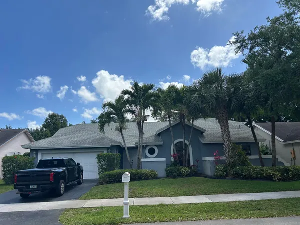 a black and white photo of a house