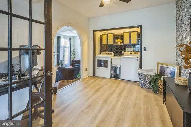 a bedroom with furniture and a window