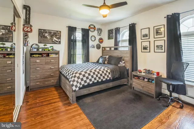 a bedroom with a bed and furniture