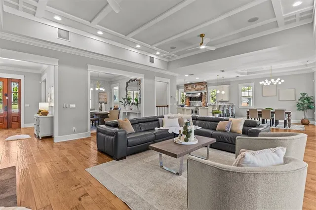 a kitchen with a stove a sink and a refrigerator