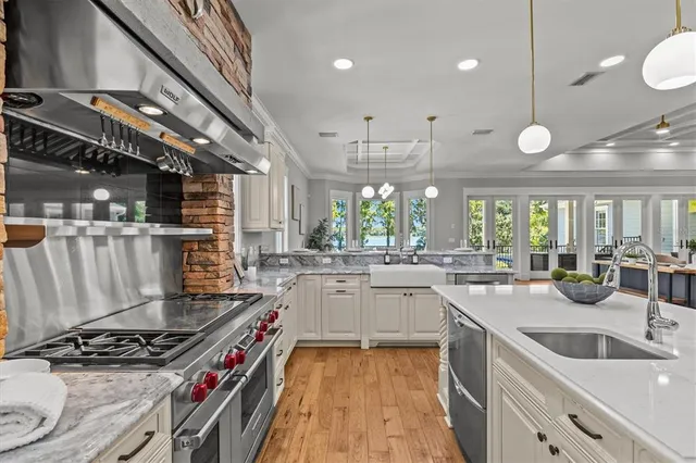 a room with furniture and pool table