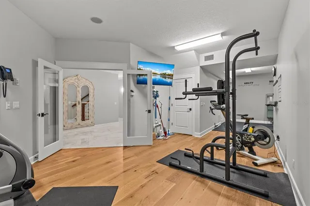 a view of a swimming pool with outdoor seating