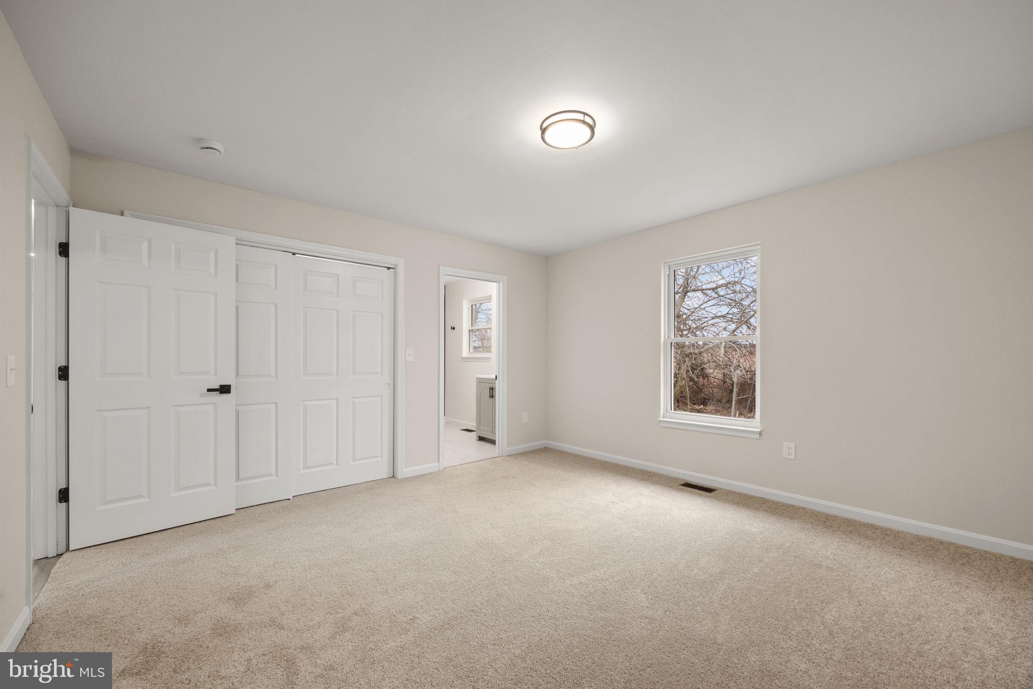 24 Bizarre Drive New Castle, DE 19720 - Photo 16 of 26 a view of an empty room with a window