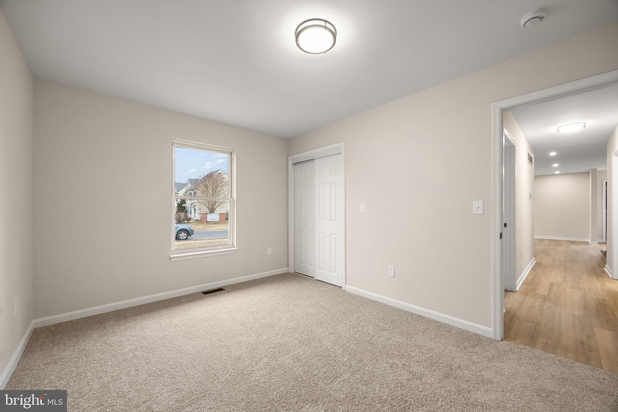 24 Bizarre Drive New Castle, DE 19720 - Photo 18 of 26 an empty room with a window