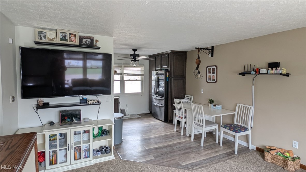 1294 Bennett Road Madison, OH 44057 - Photo 19 of 42 Living room and eat-in kitchen area