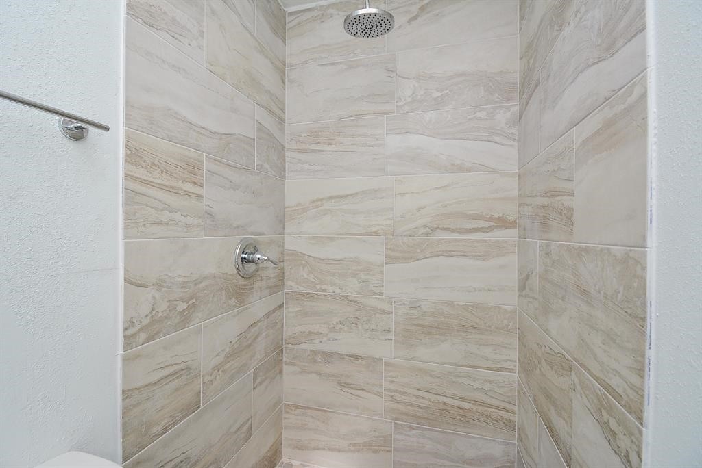 917 Defender Street Houston, TX 77029 - Photo 12 of 14 a bathroom with a shower