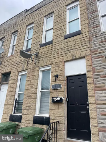 front view of a brick house with a door