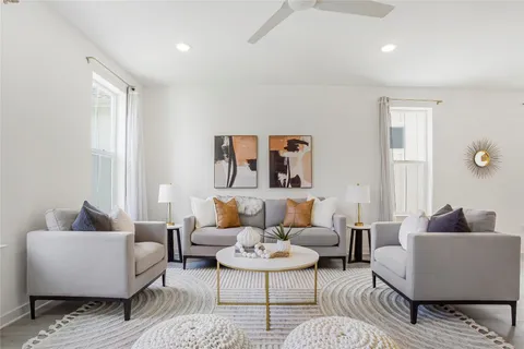 a living room with furniture and a couch