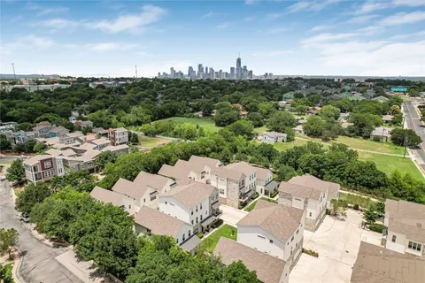 an aerial view of a city with lots of residential buildings