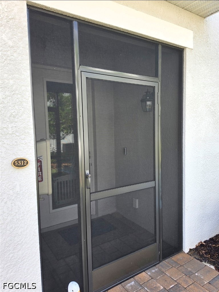 14191 Poppy Fld Loop, Unit 5312 Punta Gorda, FL 33955 - Photo 23 of 41 a bathroom with a shower