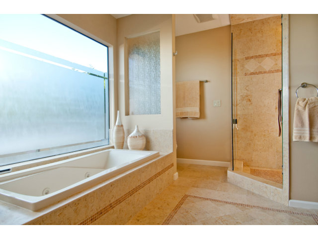 2697 Pradera Road Carmel, CA 93923 - Photo 14 of 22 a bathroom with a tub and shower