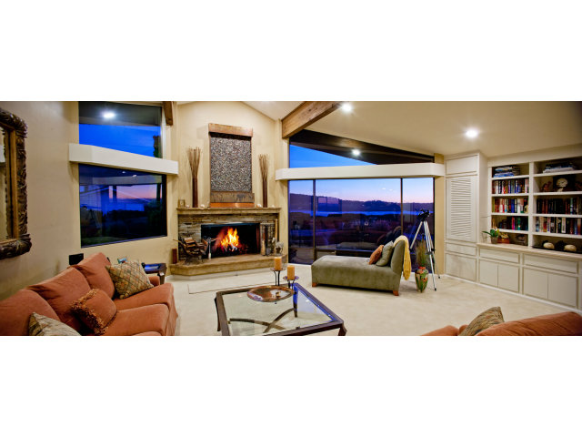2697 Pradera Road Carmel, CA 93923 - Photo 20 of 22 a living room with furniture and a fireplace