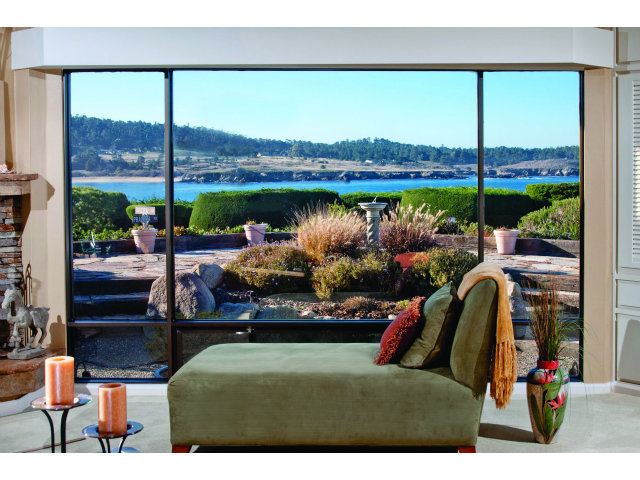 2697 Pradera Road Carmel, CA 93923 - Photo 5 of 22 a view of a living room and a floor to ceiling window