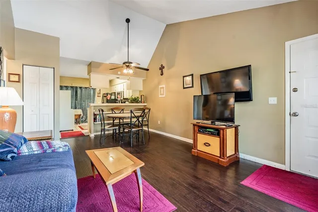 a living room with furniture and a table