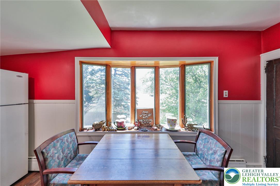 417 3rd Street Lehighton, PA 18235 - Photo 4 of 39 This cozy dining area features a prominent bay window, creating a luminous space perfect for meals.