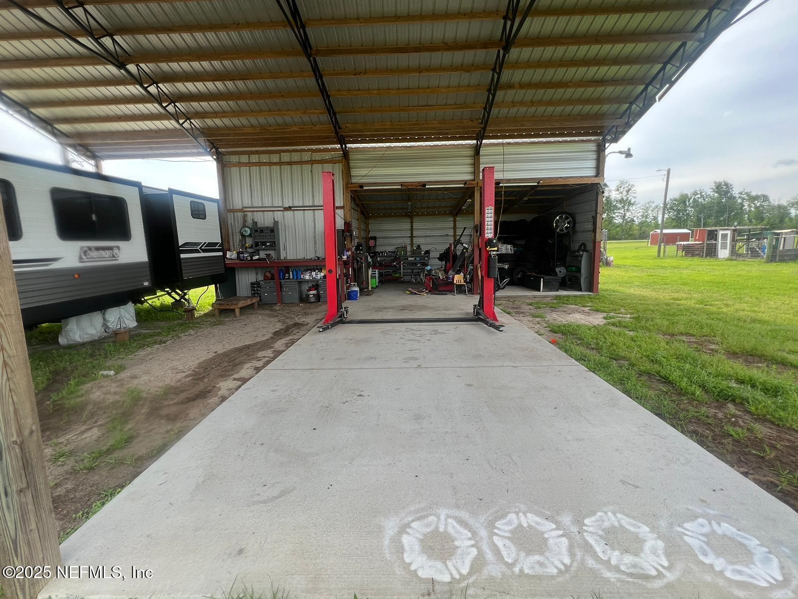 1730 Church Street Grand Ridge, FL 32442 - Photo 4 of 8 a view of a garage