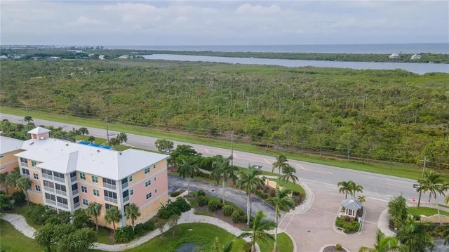 a view of a lake with a building in the background