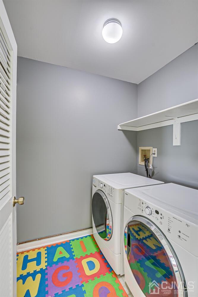 3603 Springbrook Drive Edison, NJ 08820 - Photo 22 of 30 a utility room with dryer and washer