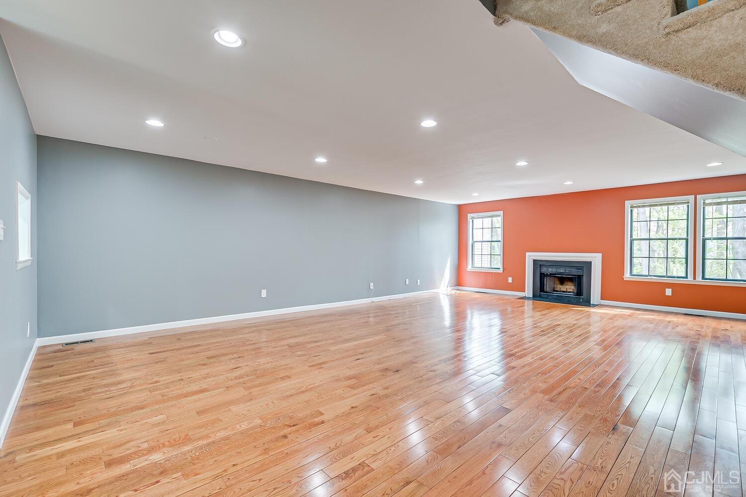 3603 Springbrook Drive Edison, NJ 08820 - Photo 4 of 30 a view of an empty room with wooden floor and a window