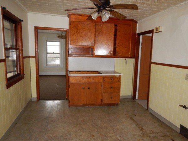 31-33 Collins Street Springfield, MA 01109 - Photo 12 of 30 a view of a kitchen from a hallway