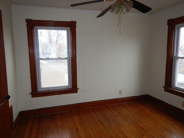 31-33 Collins Street Springfield, MA 01109 - Photo 13 of 30 an empty room with a window