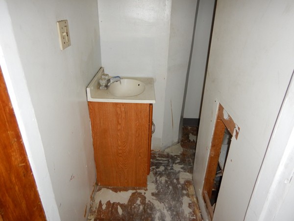 31-33 Collins Street Springfield, MA 01109 - Photo 20 of 30 a bathroom with a sink and a mirror