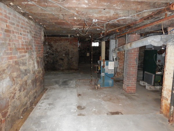 31-33 Collins Street Springfield, MA 01109 - Photo 25 of 30 a view of a room with wooden wall