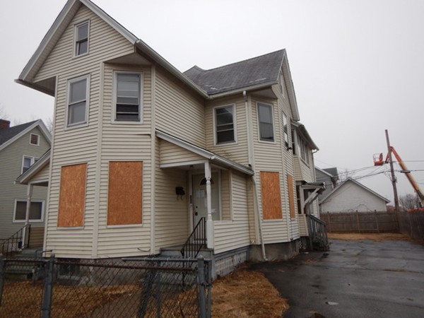 31-33 Collins Street Springfield, MA 01109 - Photo 3 of 30 a view of a house with a yard