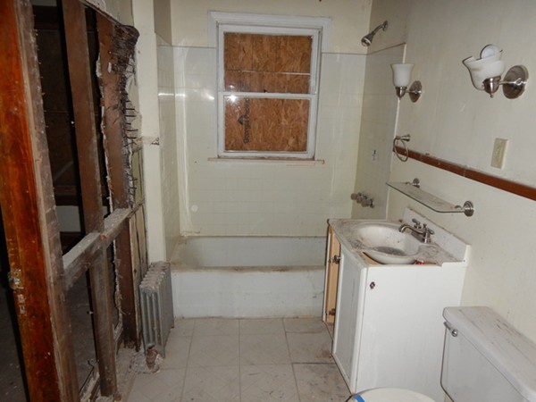 31-33 Collins Street Springfield, MA 01109 - Photo 9 of 30 a bathroom with a sink and a mirror