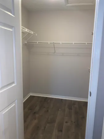 a view of an empty walk in closet