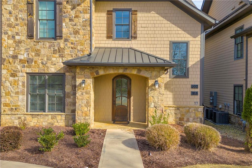 17 Cottage Lane Toccoa, GA 30577 - Photo 18 of 50 a front view of a house with a garden