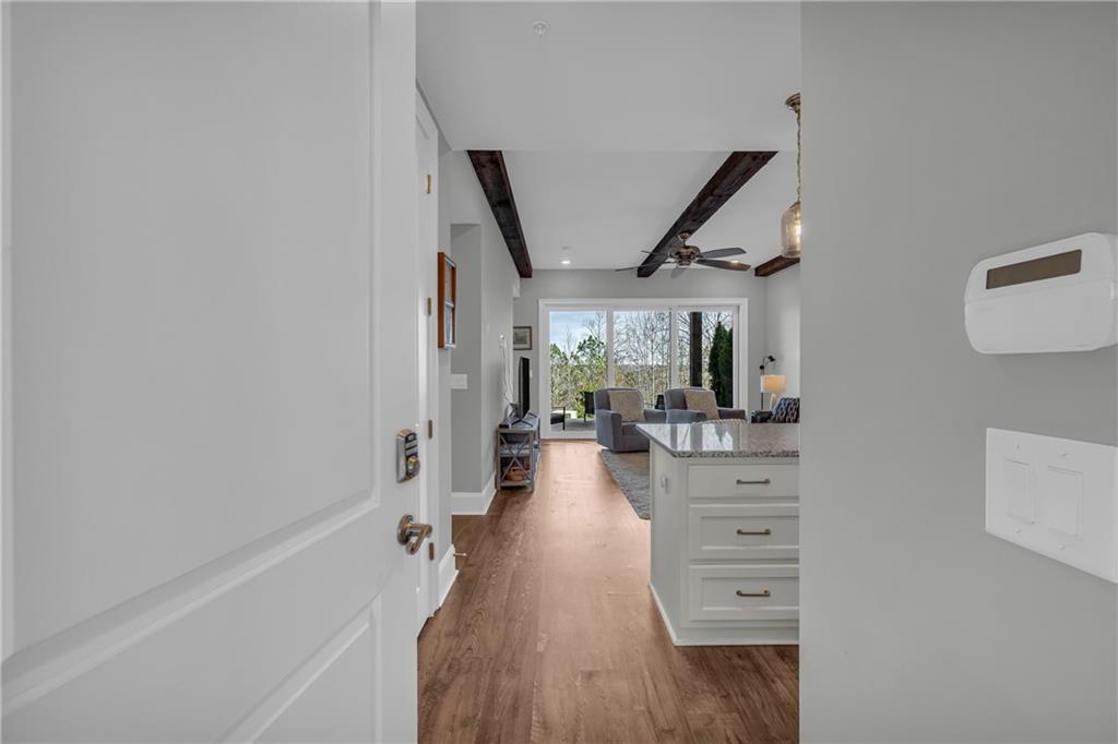 17 Cottage Lane Toccoa, GA 30577 - Photo 26 of 50 a view of hallway with living room and wooden floor