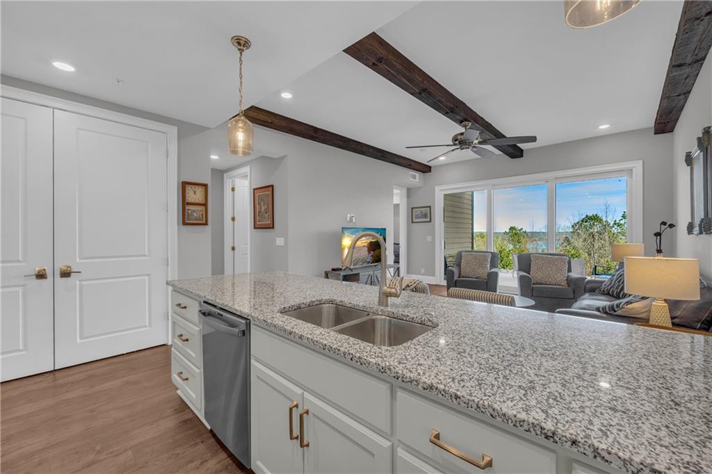 17 Cottage Lane Toccoa, GA 30577 - Photo 30 of 50 a kitchen with sink refrigerator and microwave