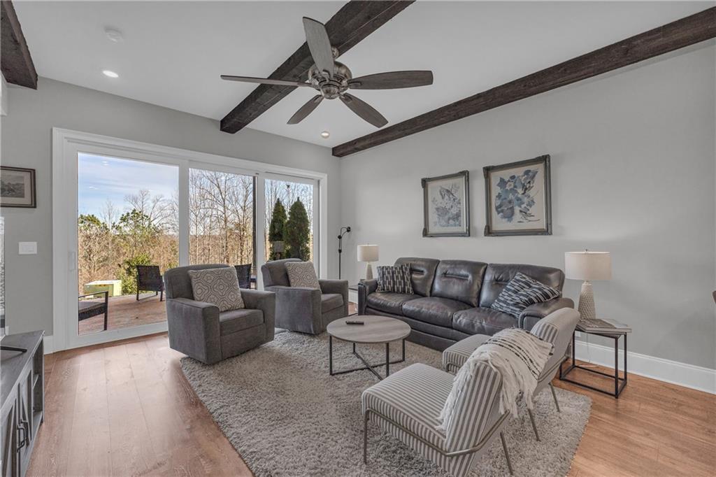 17 Cottage Lane Toccoa, GA 30577 - Photo 33 of 50 a living room with furniture and a large window