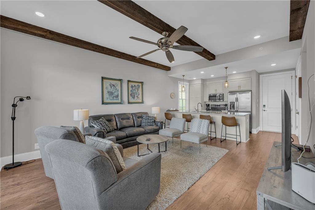 17 Cottage Lane Toccoa, GA 30577 - Photo 35 of 50 a living room with furniture kitchen view and a wooden floor