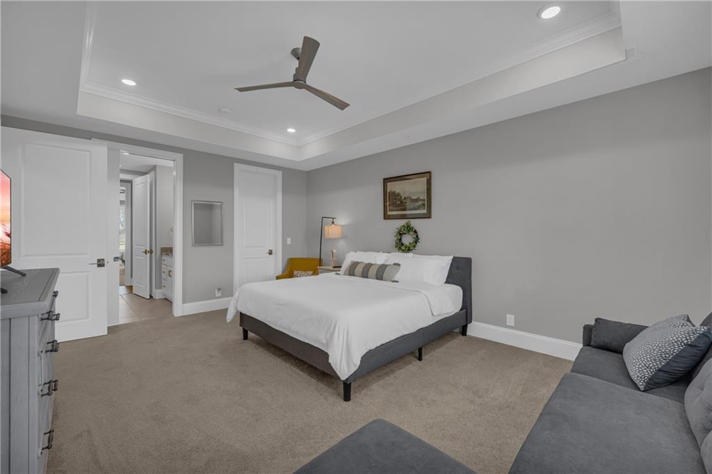 17 Cottage Lane Toccoa, GA 30577 - Photo 40 of 50 a spacious bedroom with a bed and a flat screen tv