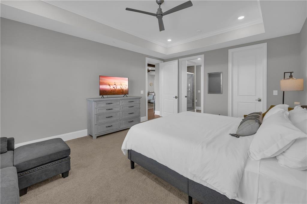 17 Cottage Lane Toccoa, GA 30577 - Photo 41 of 50 a spacious bedroom with a bed a couch and a view living room