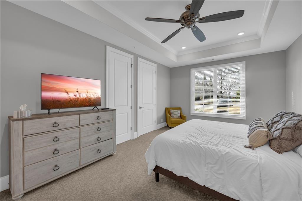 17 Cottage Lane Toccoa, GA 30577 - Photo 45 of 50 a bedroom with a bed a window and a flat screen television