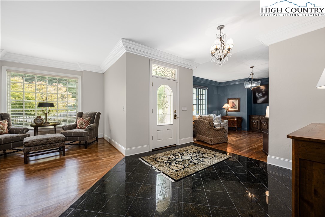 738 Country Club Road Glade Valley, NC 28627 - Photo 12 of 45 a living room with furniture and wooden floor