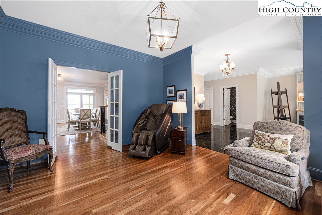 738 Country Club Road Glade Valley, NC 28627 - Photo 16 of 45 a living room with furniture and wooden floor