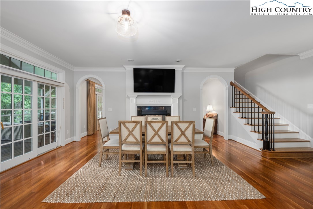 738 Country Club Road Glade Valley, NC 28627 - Photo 22 of 45 a dining room with furniture wooden floor and a rug