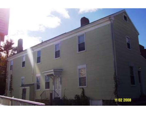 7 Center Street Wareham, MA 02571 - Photo 2 of 13 a front view of a house with entryway