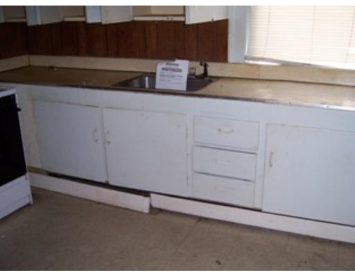 7 Center Street Wareham, MA 02571 - Photo 8 of 13 a kitchen with a sink and cabinets