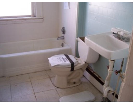 7 Center Street Wareham, MA 02571 - Photo 9 of 13 a bathroom with a sink and bathtub