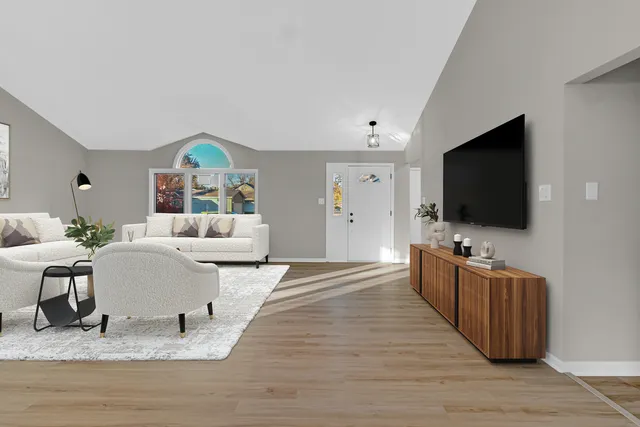 a view of a yard with wooden deck